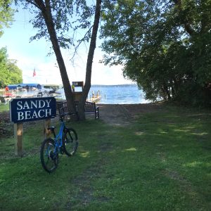 Just down the street from the Cottagewood Store, Sandy Beach is a delightful swimming spot.
